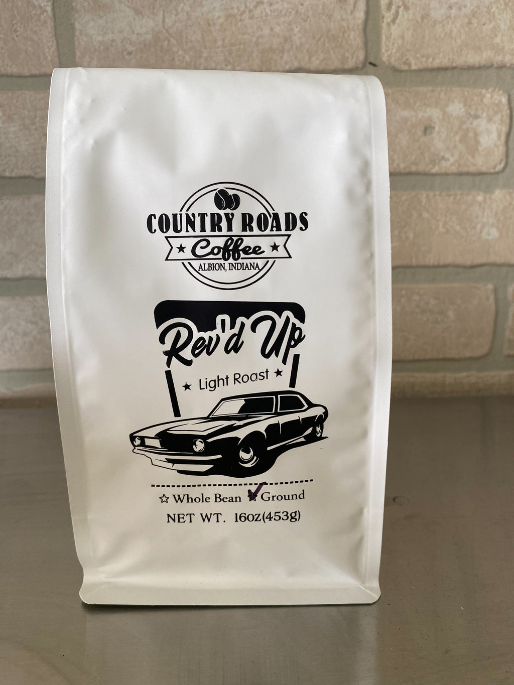 this is an image of our light roast coffee called Rev'd up. 